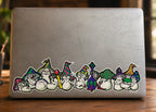 THC Mushrooms sticker stretched across bottom edge of worn laptop with scratches and multiple decals