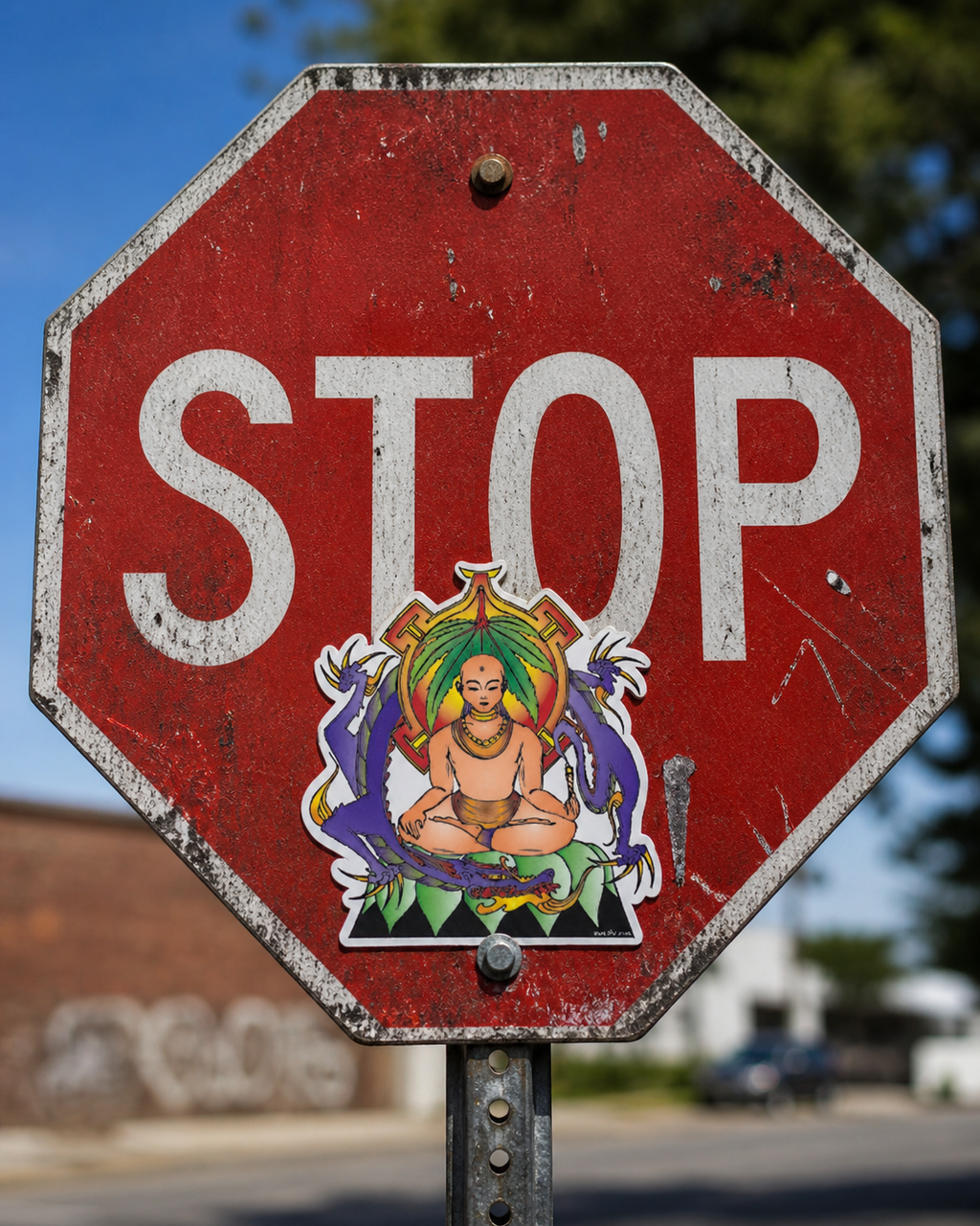 THC Nirvana sticker placed on weathered stop sign in urban outdoor setting with scratched metal texture