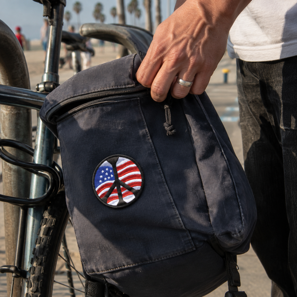 Fun USA Flag Peace Sign Patch shown in a street-style lifestyle setting