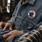 Fun Little Stinker Patch shown in a street-style lifestyle setting