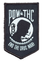 THC POW Patch featuring a black and white embroidered End the Drug War protest graphic on a shield-shaped patch