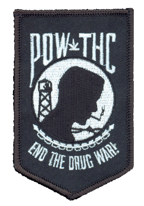 THC POW Patch featuring a black and white embroidered End the Drug War protest graphic on a shield-shaped patch