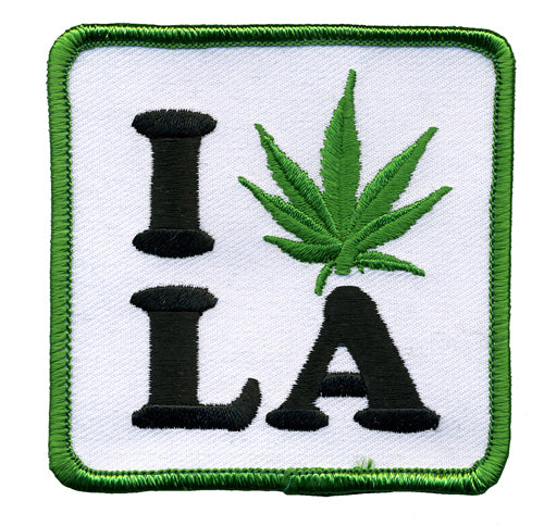 THC Leaf LA Patch featuring an embroidered “I LA” design with a green cannabis leaf replacing the heart on a white background with a green stitched border