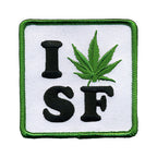 THC Leaf SF Patch featuring an embroidered “I SF” design with a green cannabis leaf replacing the heart on a white background with a green stitched border