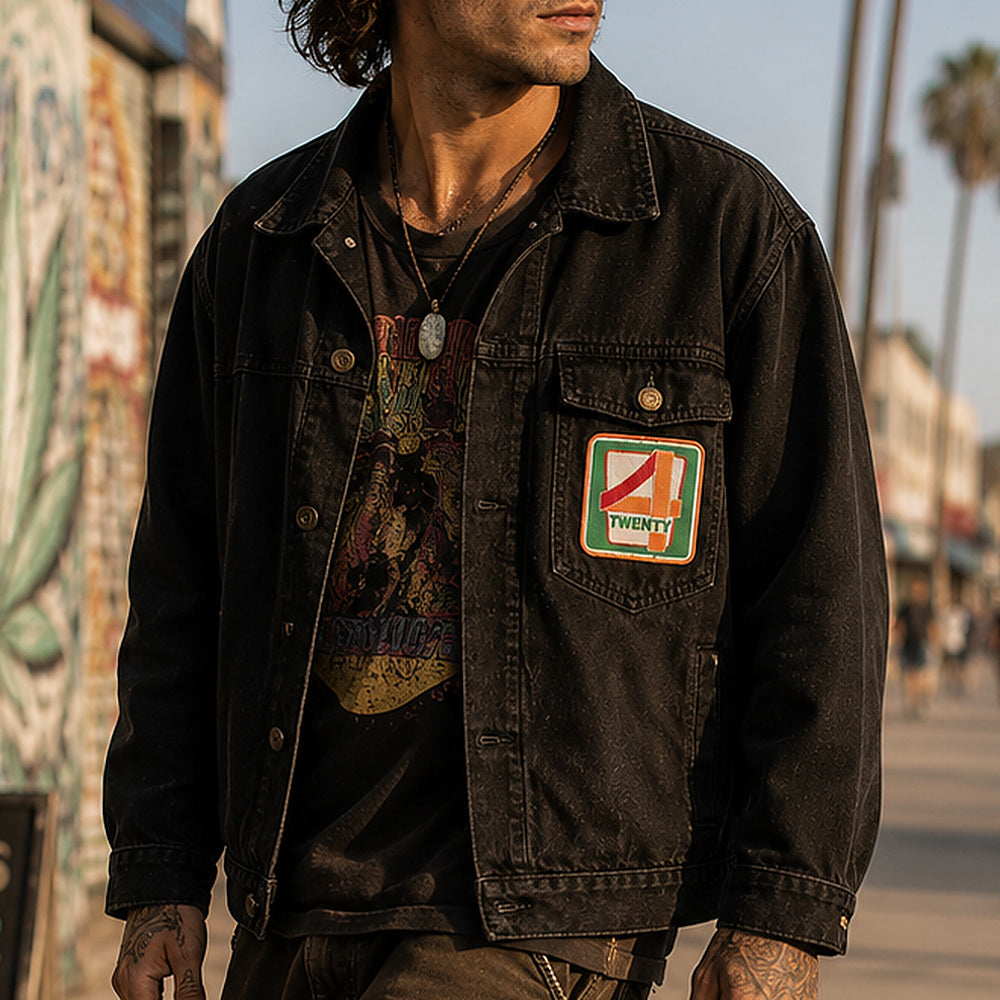 THC 420 Patch displayed on the chest pocket of a black canvas jacket worn by a skateboarder riding along a sunny beach boardwalk, featuring a retro convenience store-inspired embroidered design