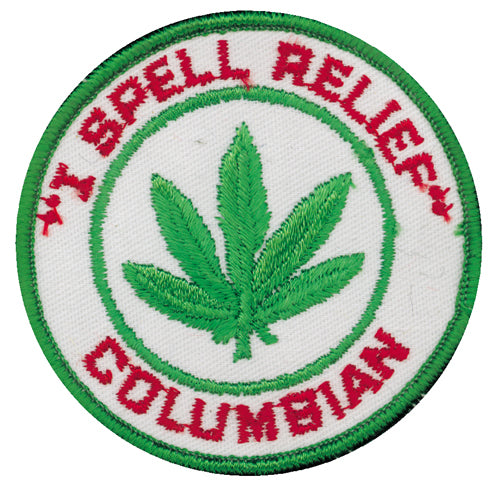 THC Columbian Patch featuring a green embroidered cannabis leaf with red lettering and a green border on a white circular background