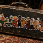 THC World Crew sticker on worn black guitar case with scratches metal latches and studio setting
