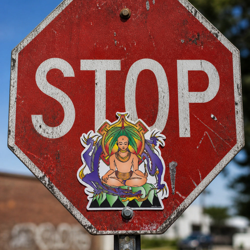 THC Nirvana sticker placed on weathered stop sign in urban outdoor setting with scratched metal texture