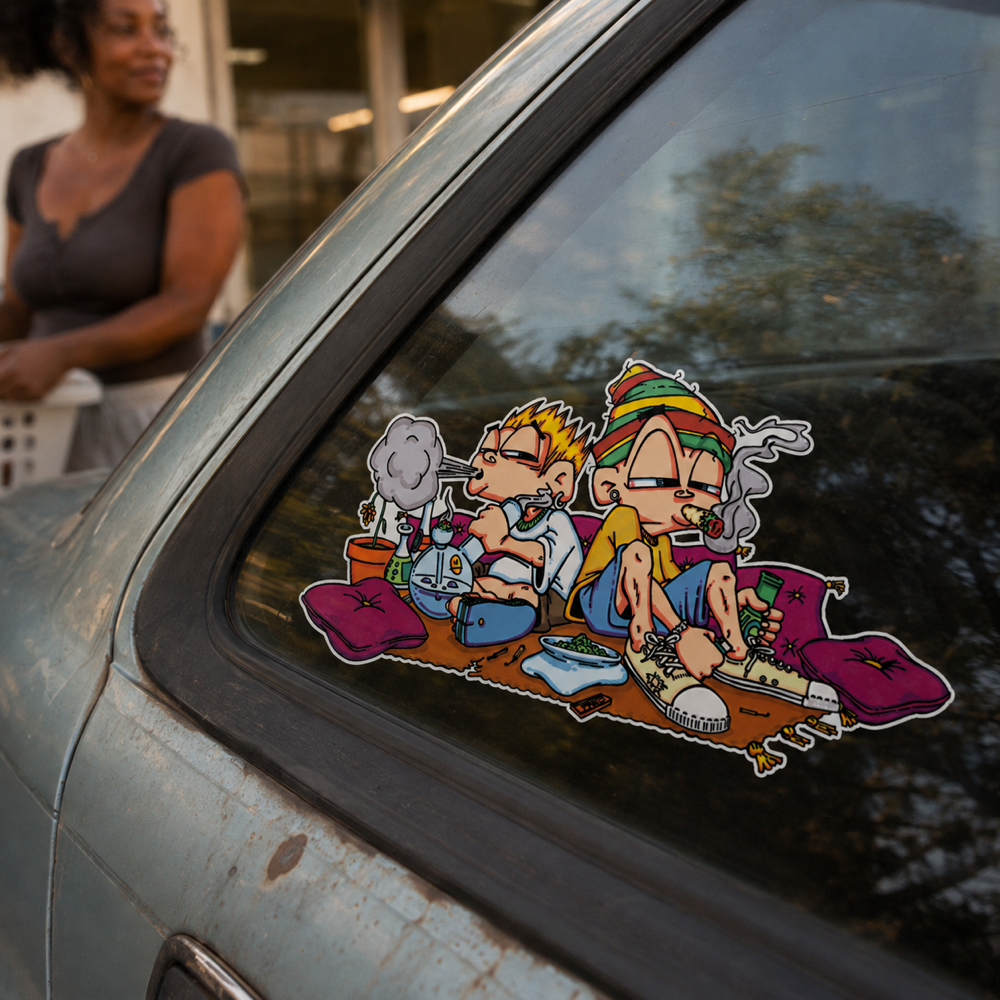 Close-up of the THC Bud Rats Sticker displayed alone on the rear window of a weathered compact car outside a neighborhood laundromat
