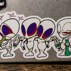 THC Alien Quartet sticker across scratched silver laptop with moody studio lighting